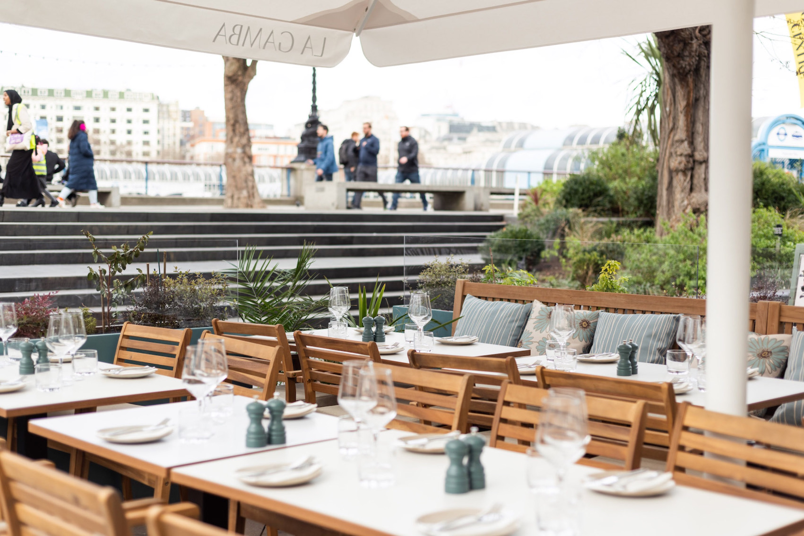 La Gamba's riverside terrace under the parasol at the Southbank Centre, the Thames promenade beyond (photo: Rebecca Dickson)